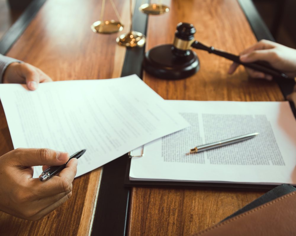 client-is-bringing-the-documents-to-clarify-the-law-to-the-lawyer-at-the-prosecutor-office-.jpg